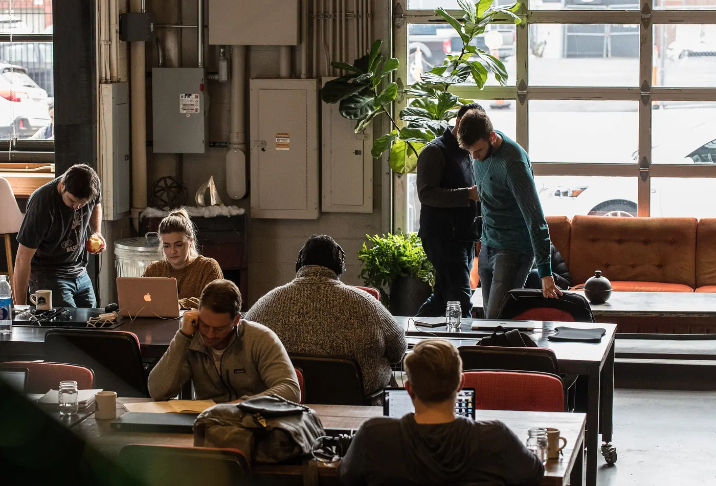 People working together at a shared table